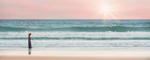 Preview wallpaper ocean, child, shore, surf, walk, horizon, pastel