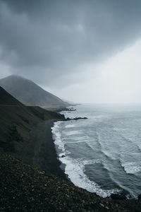 Preview wallpaper ocean, fog, sea, rocks, stones, pebbles