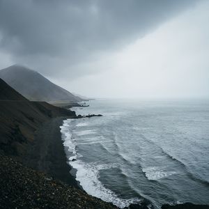 Preview wallpaper ocean, fog, sea, rocks, stones, pebbles