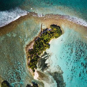 Preview wallpaper ocean, island, aerial view, water, palm trees