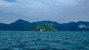 Preview wallpaper ocean, island, rocks, horizon, waves, ripples