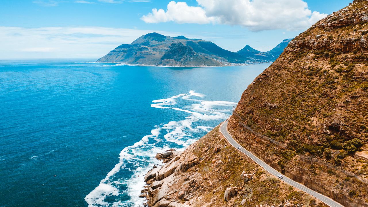 Wallpaper ocean, mountain, road, turn, sky