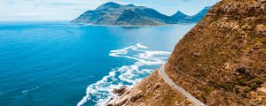 Preview wallpaper ocean, mountain, road, turn, sky