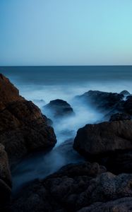 Preview wallpaper ocean, rocks, stones, fog, horizon