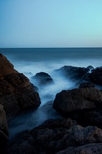 Preview wallpaper ocean, rocks, stones, fog, horizon