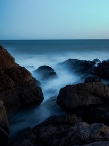 Preview wallpaper ocean, rocks, stones, fog, horizon