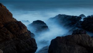 Preview wallpaper ocean, rocks, stones, fog, horizon