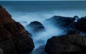 Preview wallpaper ocean, rocks, stones, fog, horizon