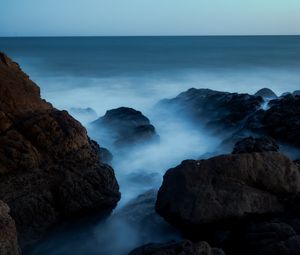 Preview wallpaper ocean, rocks, stones, fog, horizon