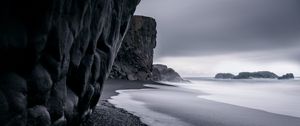 Preview wallpaper ocean, rocks, surf, pebbles, bw, dark