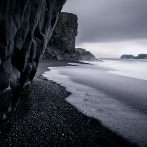 Preview wallpaper ocean, rocks, surf, pebbles, bw, dark