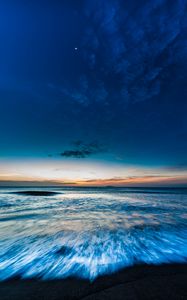 Preview wallpaper ocean, sea, horizon, sunset, shore, surf, sky