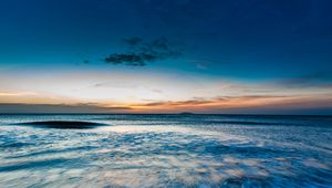 Preview wallpaper ocean, sea, horizon, sunset, shore, surf, sky