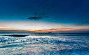 Preview wallpaper ocean, sea, horizon, sunset, shore, surf, sky