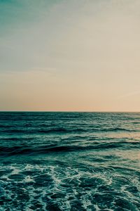 Preview wallpaper ocean, sea, horizon, water, foam, waves, sunset