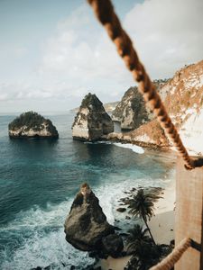 Preview wallpaper ocean, shore, rocks, beach, ropes, view