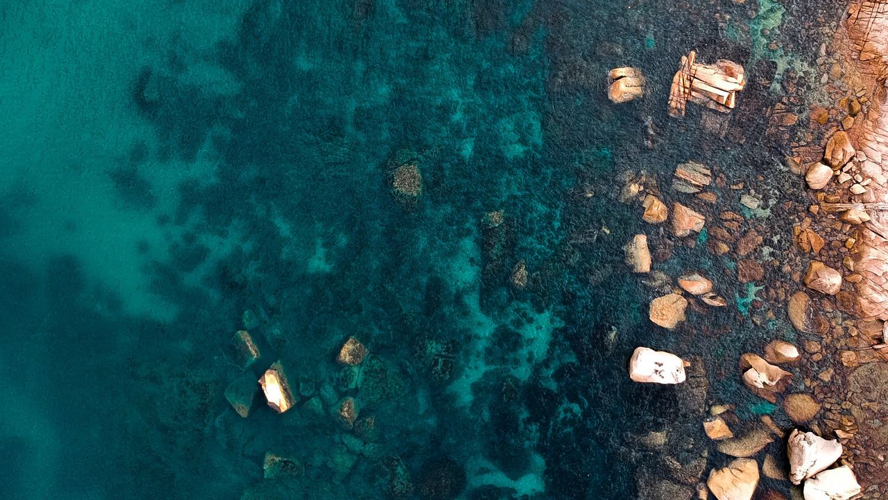 Wallpaper ocean, stones, aerial view, water, ripples, bottom