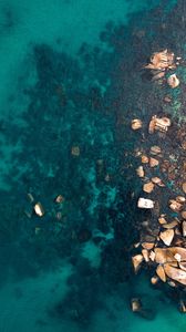 Preview wallpaper ocean, stones, aerial view, water, ripples, bottom