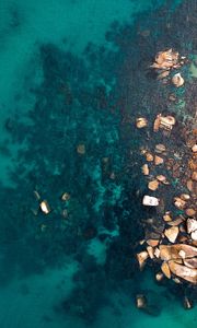 Preview wallpaper ocean, stones, aerial view, water, ripples, bottom