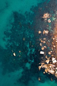 Preview wallpaper ocean, stones, aerial view, water, ripples, bottom