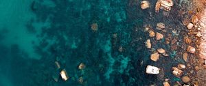 Preview wallpaper ocean, stones, aerial view, water, ripples, bottom