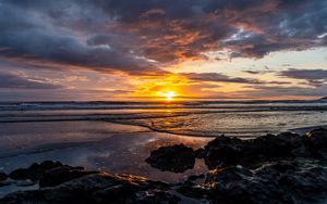 Preview wallpaper ocean, stones, horizon, sunset, dark