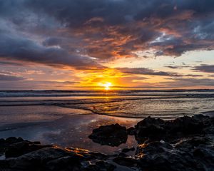 Preview wallpaper ocean, stones, horizon, sunset, dark