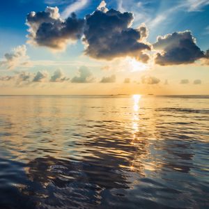 Preview wallpaper ocean, sun, clouds, reflection