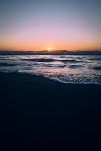 Preview wallpaper ocean, sunset, beach, waves, dusk