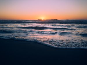 Preview wallpaper ocean, sunset, beach, waves, dusk