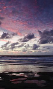 Preview wallpaper ocean, sunset, coast, clouds, shore, beautiful landscape