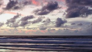 Preview wallpaper ocean, sunset, coast, clouds, shore, beautiful landscape