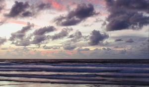 Preview wallpaper ocean, sunset, coast, clouds, shore, beautiful landscape