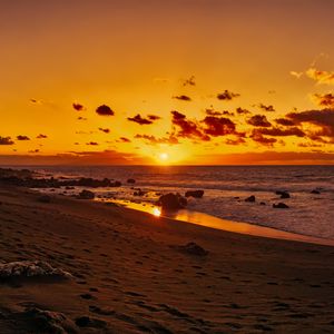 Preview wallpaper ocean, sunset, shore, sand, stones, valle gran rey, canary islands, spain
