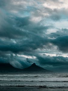 Preview wallpaper ocean, surf, rocks, clouds, overcast, storm
