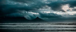 Preview wallpaper ocean, surf, rocks, clouds, overcast, storm