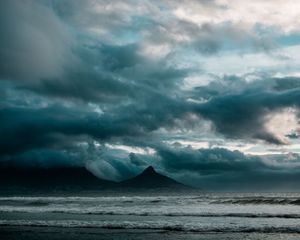 Preview wallpaper ocean, surf, rocks, clouds, overcast, storm