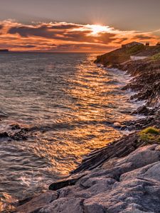 Preview wallpaper ocean, surf, sunset, shore, rocks