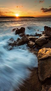 Preview wallpaper ocean, surf, waves, stones, sunset