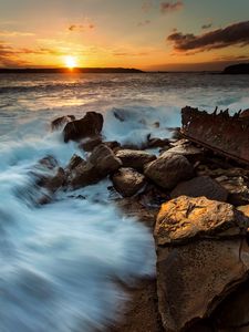 Preview wallpaper ocean, surf, waves, stones, sunset