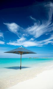 Preview wallpaper ocean, umbrella, horizon, clouds, tropics, shore