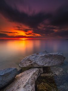 Preview wallpaper ocean, water, stones, horizon, sunset