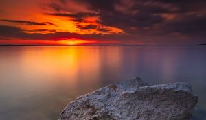 Preview wallpaper ocean, water, stones, horizon, sunset