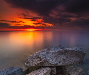 Preview wallpaper ocean, water, stones, horizon, sunset