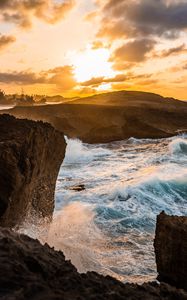 Preview wallpaper ocean, water, waves, rocks, sunset