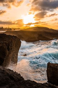 Preview wallpaper ocean, water, waves, rocks, sunset