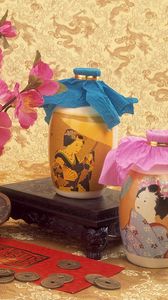 Preview wallpaper oil, bottles, coins, flowers, vase