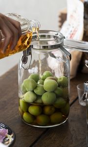 Preview wallpaper olives, oil, jar, cooking