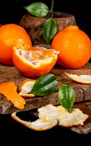 Preview wallpaper orange, citrus, fruit, peel, leaves