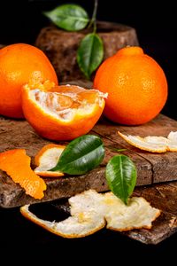 Preview wallpaper orange, citrus, fruit, peel, leaves
